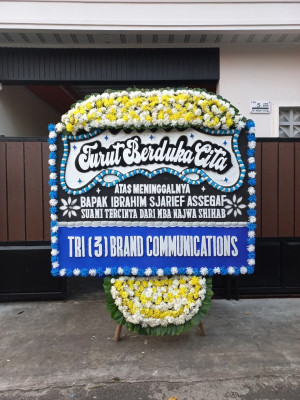 Papan Bunga Duka di Pal Merah